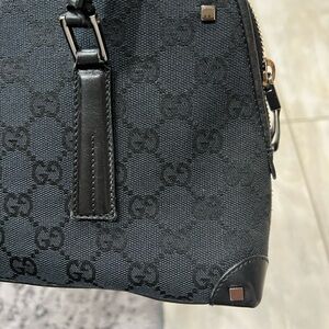Authentic Gucci Monogram Shoulder Handbag with Silver Accents
